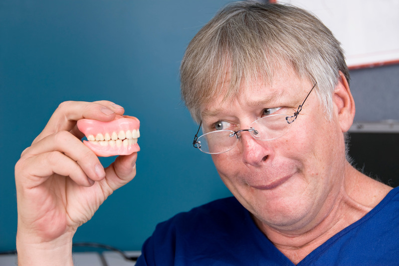 Patient questioning their dentures